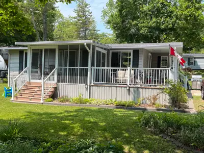 A huge 2010 43’x12’ Northlander Cottager with a massive 38’x12’ Florida room, a 10’x13’ screen room...