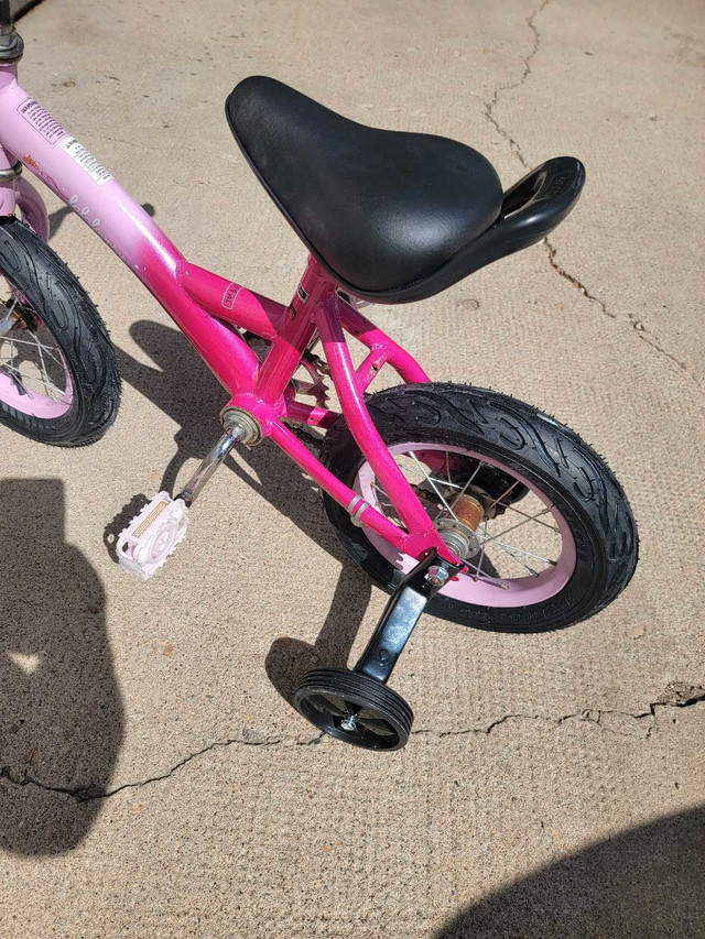 12 inch pink kids bike in Kids in Medicine Hat - Image 3