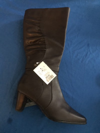 Never worn leather Blondo knee high boots size 8.5 wide width