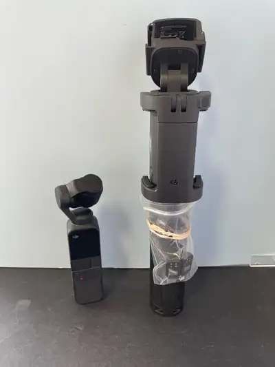 DJI OSMO POCKET 1 W/TRIPOD, View more