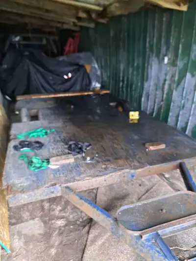 6' x 10' well used flatbed utility trailer. Homemade no ownership. 2" ball required. Working tail li...
