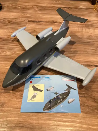 Several sets including instructions: - private jet - tow truck - go kart garage - timber truck - sub...