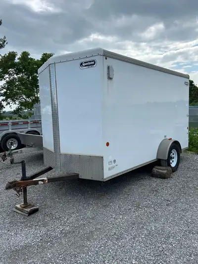 12’x6’ enclosed trailer with side door. Currently setup for HVAC/plumbing. Comes with pipe threader...