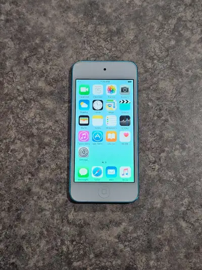 Apple iPod Touch 5th Gen 32GB in blue, tested and fully working. Good used condition with normal cos...