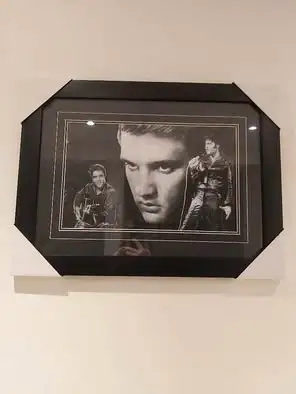 Bring a touch of rock ‘n’ roll history into your home with this beautiful pair of Elvis Presley fram...