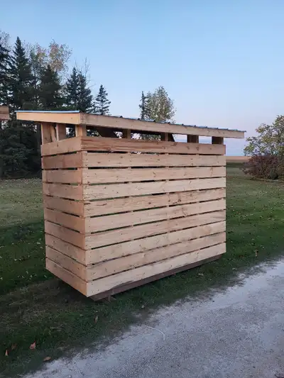 Firewood shed 4x8 Build from rough cut lumber The bottom skids are pressure treated 4x4s Outside dim...