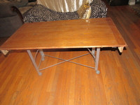 IKEA Four-wheeled metal base and pure wood table top 48X24X23"in