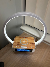 Table light with wireless phone charger and clock