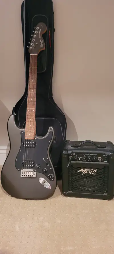 Never used electric guitar and Amp., View more