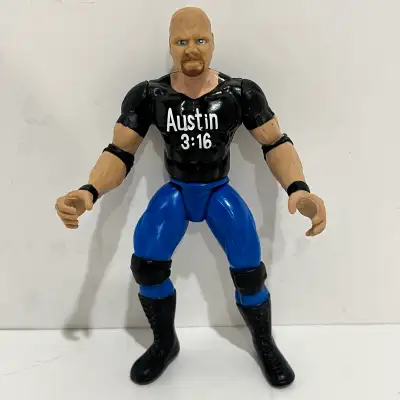 Own a piece of wrestling history with this pre-owned vintage 1997 Jakks Pacific Stone Cold Steve Aus...