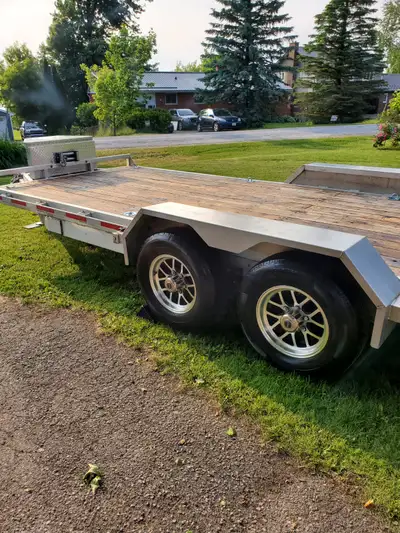 2025 Enbeck aluminum car hauler with $ 2500 in reenforced upgrades and a 10000 lb warn winch