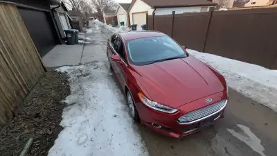 Selling my 2014 Ford Fusion SE, sedan with a 2.5L engine and automatic transmission. The vehicle has...