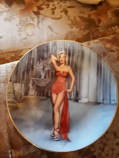 This rare and retired Marilyn Monroe Royal Orleans How to Marry a Millionaire Collector Plate, broug...