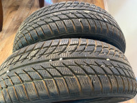 Two 195/65R15 winter tires. Tread depth at 10/32nds.