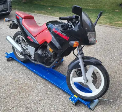 Low-profile steel motorcycle dolly made by Powerfist Capacity up to 1,250 lbs bikes Max. tire width...