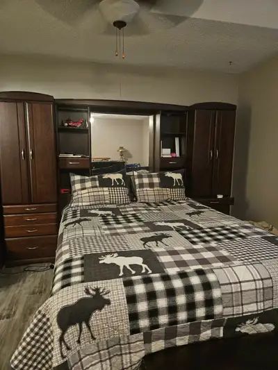 Bed  with attached Armoires, View more