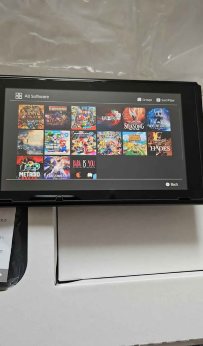 Nintendo Switch + 128 GB SD + modchiped, View more
