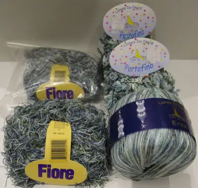 PRICE IS FIRM AND WILL NOT BE LOWERED. Two balls of "Fiore", variegated denim blues with moss green,...