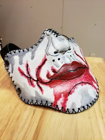 Joker leather biker mask. Suede lined, 100% leather mask and adjustable strap with perimeter stitchi...