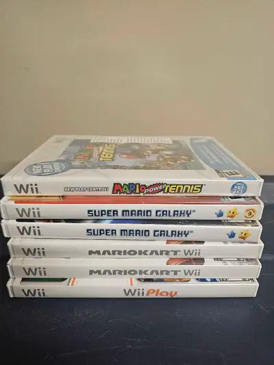 Wii play 10$ Mario kart 40$ ea Super mario galaxy 20$ ea Mario power tennis(brand new) 30$ Tested an...
