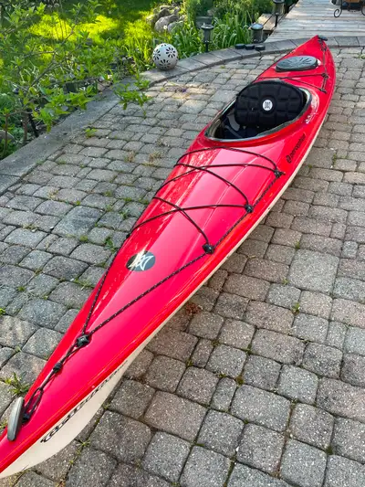 Great kayak for beginner or seasoned paddler.Rubber around cockpit a little worn.Includes paddles