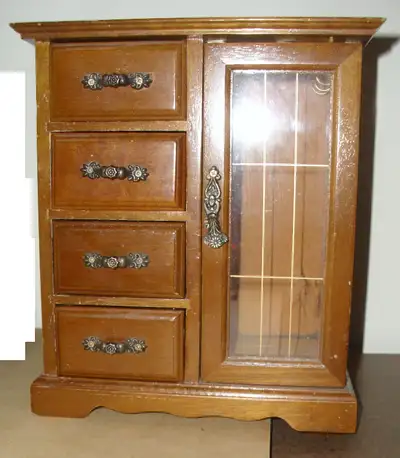 From the early 1980's Has four drawers - one of them holds rings Please see pictures for measurement...