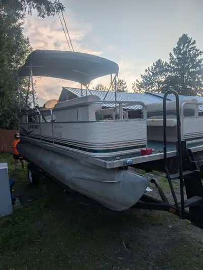 2005 legend pontoon boat. Very little hours on the motor prop has a little Nick in it. Seats could b...