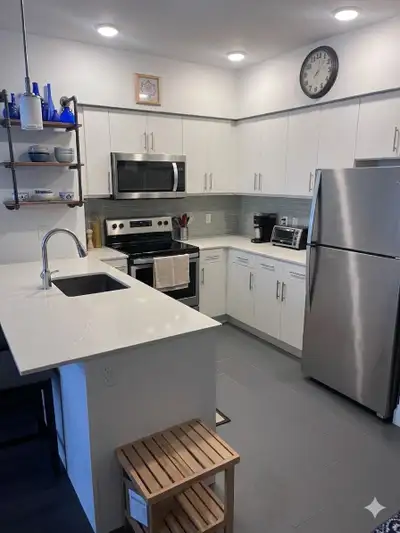 One bedroom condo -698 sq ft -200 sq ft patio - natural gas line and bbq that is included with the u...