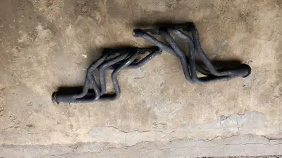 Headers in good condition. No leaks. Powder coated black. Was installed in sqaure body truck. 613-58...