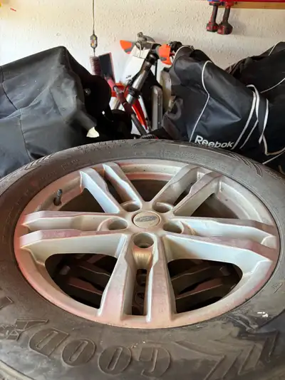 Selling rims and tires off a 2021 ford explorer tires are probably good for another season or 2. $40...