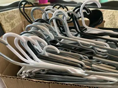 over 30 like-new plastic clothes hangars - 2 top hooks, View more