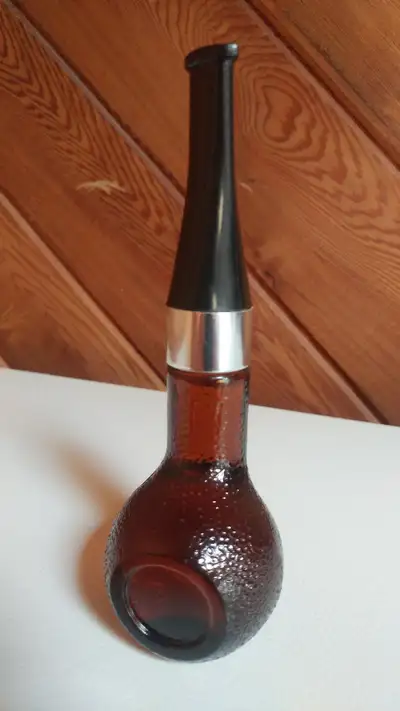 ESTATE SALE Selling my grandfather's collectible Men's After Shave Cologne Pipe Shaped Bottle. It is...
