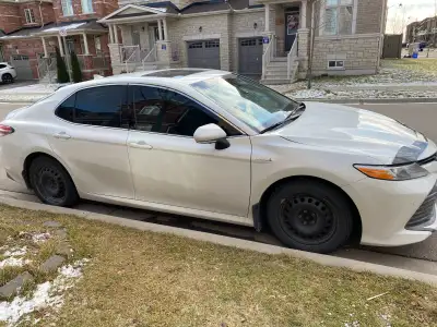 Sparingly used 17" Winter tires Bridgestone Blizzak 215/55R17 WS80 94H BL (set of 4 tires) along wit...