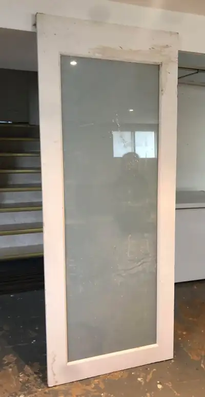 9A door with frosty glass , 32" x 80". Asking $ 50.00. If interested please contact me.