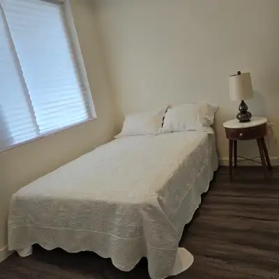A bedroom for rent, with a full bed is located at the ground floor of a New Condo townhouse, in Sout...