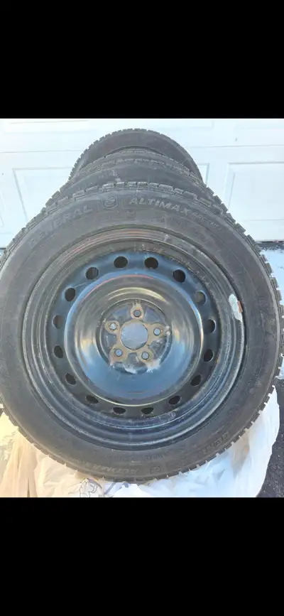 Selling set of 4 225/55/18 winter tires and rims. General altimax artoc. Excellent co dition. Lots o...