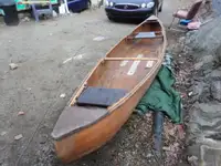 14.5ft cedar strip canoe,50lbs thrust motor.