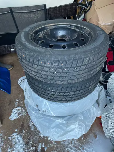 Four 215/60 R16 Goodyear Winter Command tires on rims. Used 1 winter, good condition. $700 OBO