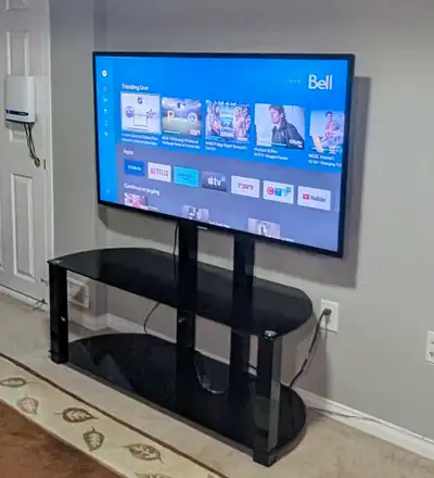 TV, surround sound speaker system, and stand package, View more