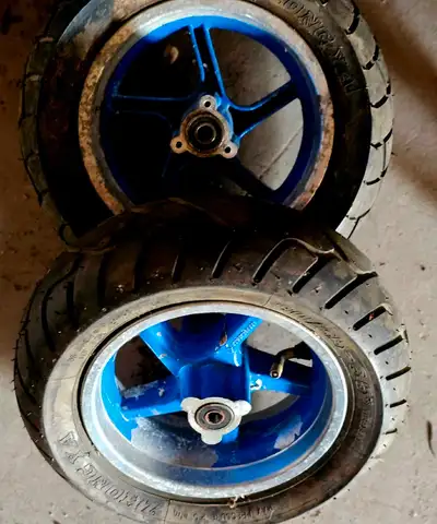 Scooter wheel setup.. not sure what from... Just needs wash... some missing paint.. but there held a...