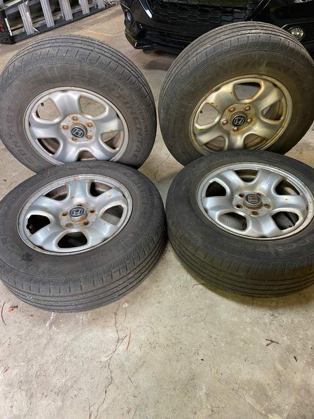 4 Pneus 215/70R 16 sur mags dans Pneus et jantes  à Ville de Montréal