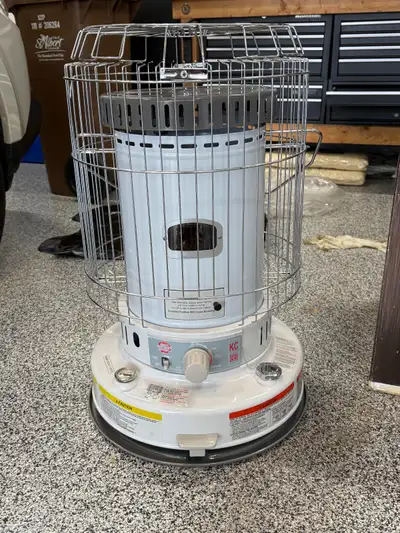 Kero-World KC2404b portable kerosene heater. Used once to heat 500 sq ft uninsulated garage to cure...