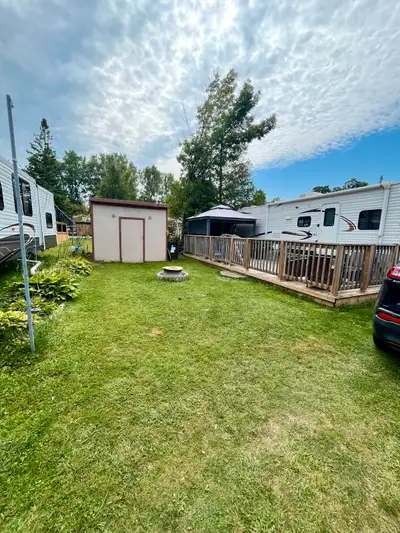 LOWER PRICE!! 32 Ft Sportsman Trailer located in sought after park in beautiful Bayfield. In Paul Bu...