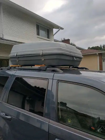 Roof top storage container Great for camping Has suction cups and wooden rails so you can still use...