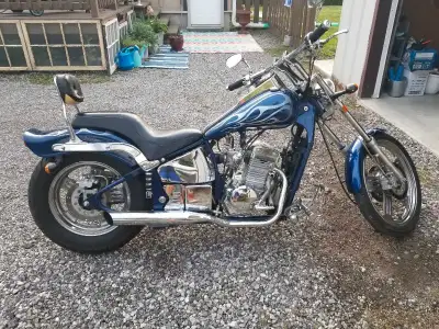 2007 Johnny Pag Spyder, blue. 300cc Great bike to get around town. Comes with battery charger, rain...