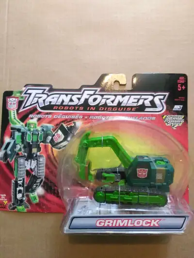Grimlock Robots in Disguise Transformer toy from 2001 MOC The toy has never been opened. The packagi...