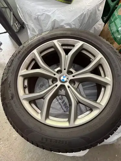 Selling a set of 19-inch original BMW rims with winter tires from a 2-year-old BMW X5. Tire size: 26...