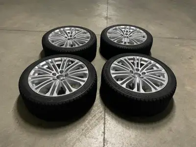 OEM Audi 245/40/18 winter wheels. Like-new condition, no defects at all. $1700