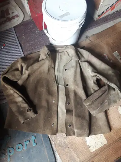 Welder's leather jacket., View more