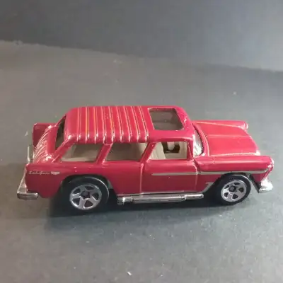 Made by Hot Wheels in Malaysia. Measures 2 3/4 inches long.